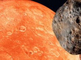Астрономы раскрыли загадку рождения астероидной "свиты" Марса