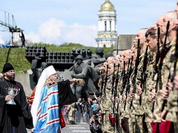 Вирус национализма проник в УПЦ МП: Часть священников поддержала АТО