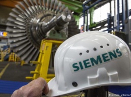 Siemens ограничивает деятельность в России в ответ на "крымский скандал"