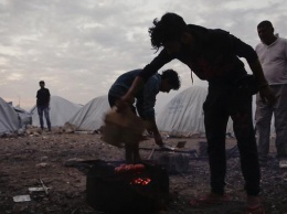ЕС намерен переселить беженцев в Греции из лагерей в квартиры