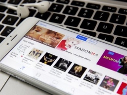 Apple договорилась с Warner Music о снижении цен на музыку
