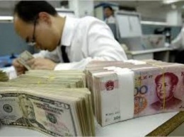 Китай может ударить по доллару