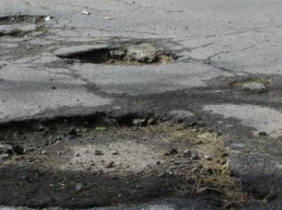 Не горят желанием подрядчики браться за ремонт дороги на улице Шмидта в Покровске