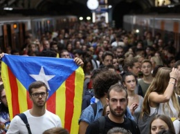 В Каталонии проходит всеобщая забастовка против полицейского насилия