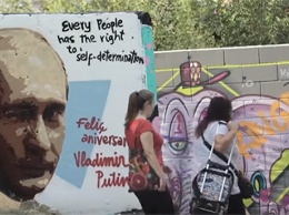 Из Парижа с любовью: в Европе появились граффити ко дню рождения Путина