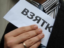 В Харькове госисполнитель требовал от бизнесмена $4 тысячи