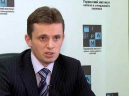 На финансовой игле: политолог рассказал, как корпорации Запада становятся хозяевами Украины