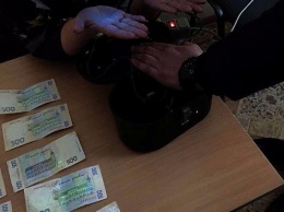 Главу Кривоозервской РГА задержали за вымогательство взятки в виде кресла