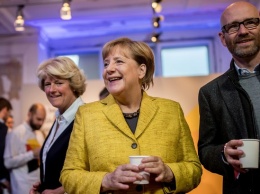 Политсилы Германии распределили места в новом правительстве