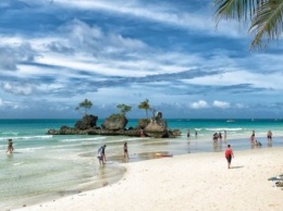 Филиппины: райский белый пляж тонет в нечистотах