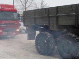 За полдня 1 марта кременчугские спасатели вытащили из сугробов 14 грузовиков (фоторепортаж)