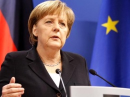 В Германии сегодня определятся с будущим коалиции во главе с Меркель