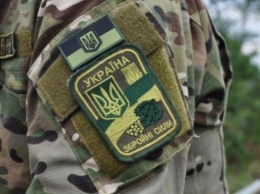 На николаевском военном полигоне взялись за оружие резервисты