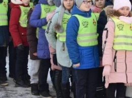 Школьники Чернигова наденут светоотражающие жилеты