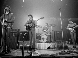 Редкие гастрольные снимки The Beatles ушли с молотка за треть млн долларов
