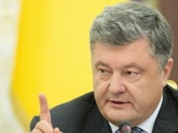 Порошенко: В украинских тюрьмах находится 23 российских офицера. Лозунг «их там нет» больше не проходит в мире