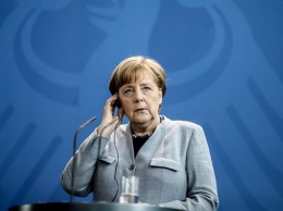 Меркель: Германия не будет участвовать в ударе по Сирии