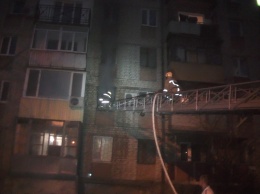 В Харькове прохожий спас из огня двухлетнего мальчика и пожилого мужчину