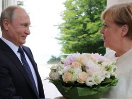 В Госдуме РФ ответили на заявление об «оскорбительном» букете Путина для Меркель