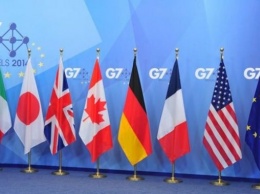 Трамп настаивает на возвращении России в G8
