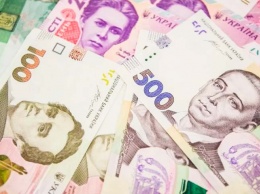 Украину заполнили фальшивки. Как проверить деньги «на глаз»?