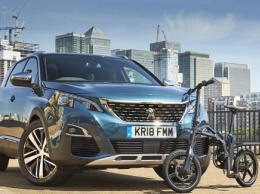 В оснащение кроссовера Peugeot 5008 добавили электровелосипед