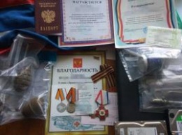 На Херсонщине в доме пособника оккупантов нашли медали за аннексию Крыма, российские документы и гранаты