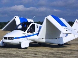 Terrafugia готовит гибридный летающий электромобиль