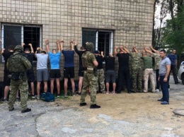 В Одессе вооруженные люди пытались захватить предприятие