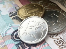 Российскому рублю грозит обвал на 15% из-за решения США