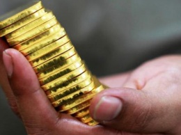 Сократился спрос на золото - World Gold Council