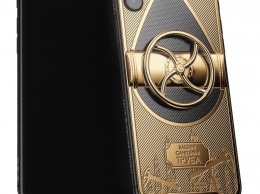 В России создан iPhone X с золотым вращающимся вентилем