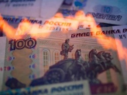 Рубль и акции российских гигантов падают в ожидании новых санкций США