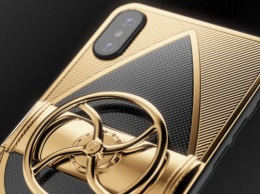 В России Caviar создала iPhone X с золотым вращающимся вентилем