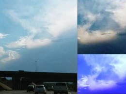 Прячущийся за облаками треугольный корабль пришельцев сняли в Канзас-сити