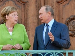 Путин и Меркель обсудили Украину и "Северный поток"