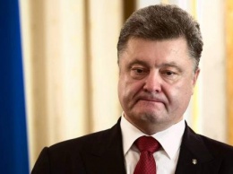 «Убийство Захарченко»: Порошенко может ввести военное положение и остаться у власти