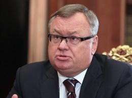 Глава ВТБ поспорил с министром Орешкиным о подходящем времени для продажи долларов