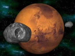 Уфологи: Фобос откололся от Марса после столкновения с Нибиру