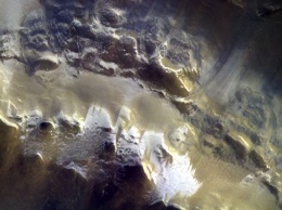 Российский прибор нашел водяной лед на Марсе