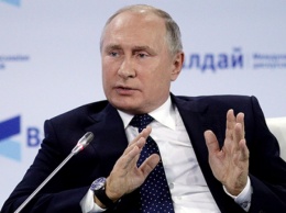 Путин считает, что к трагедии в Керчи привела глобализация и интернет