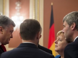 Гостья из будущего прошлого: Зачем Ангела Меркель гостила в Украине