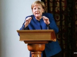 Берлин останется верен миграционному договору ООН - Меркель