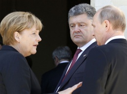 Украинские СМИ: Меркель ненавидит Путина и «сливает» секреты Порошенко