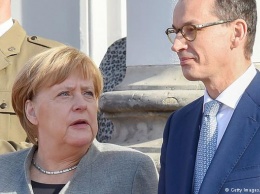Комментарий: Канцлер не растопила лед в отношениях Берлина и Варшавы