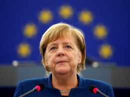 Меркель поддержала спорный миграционный пакт ООН