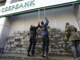 Суд отменил арест акций украинской «дочки» Сбербанка