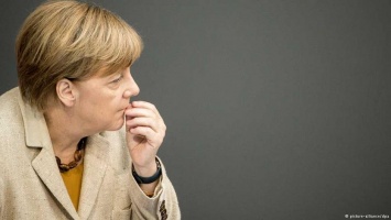 Bild: Меркель встала на защиту миграционной политики Германии