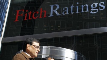 Fitch заявляет, что повысит рейтинги Украины после успешного завершения обмена долга