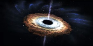 Массивная черная дыра поглощает звезду